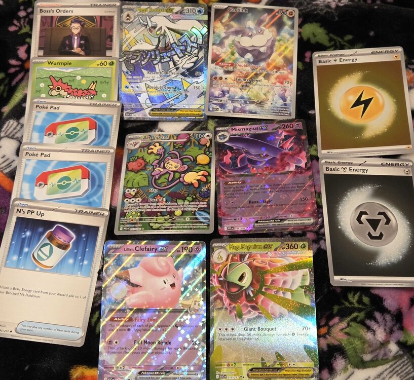Regular Boss' Orders (Corbeau), Wurmple (he's cute), x2 Poke Pads, regular N's PP Up, FA Mega Froslass, alt art Ambipom, alt art Carbink, Mismagius ex, Lillie's Clefairy ex, Mega Meganium ex, holo Lightning Energy, holo Steel Energy